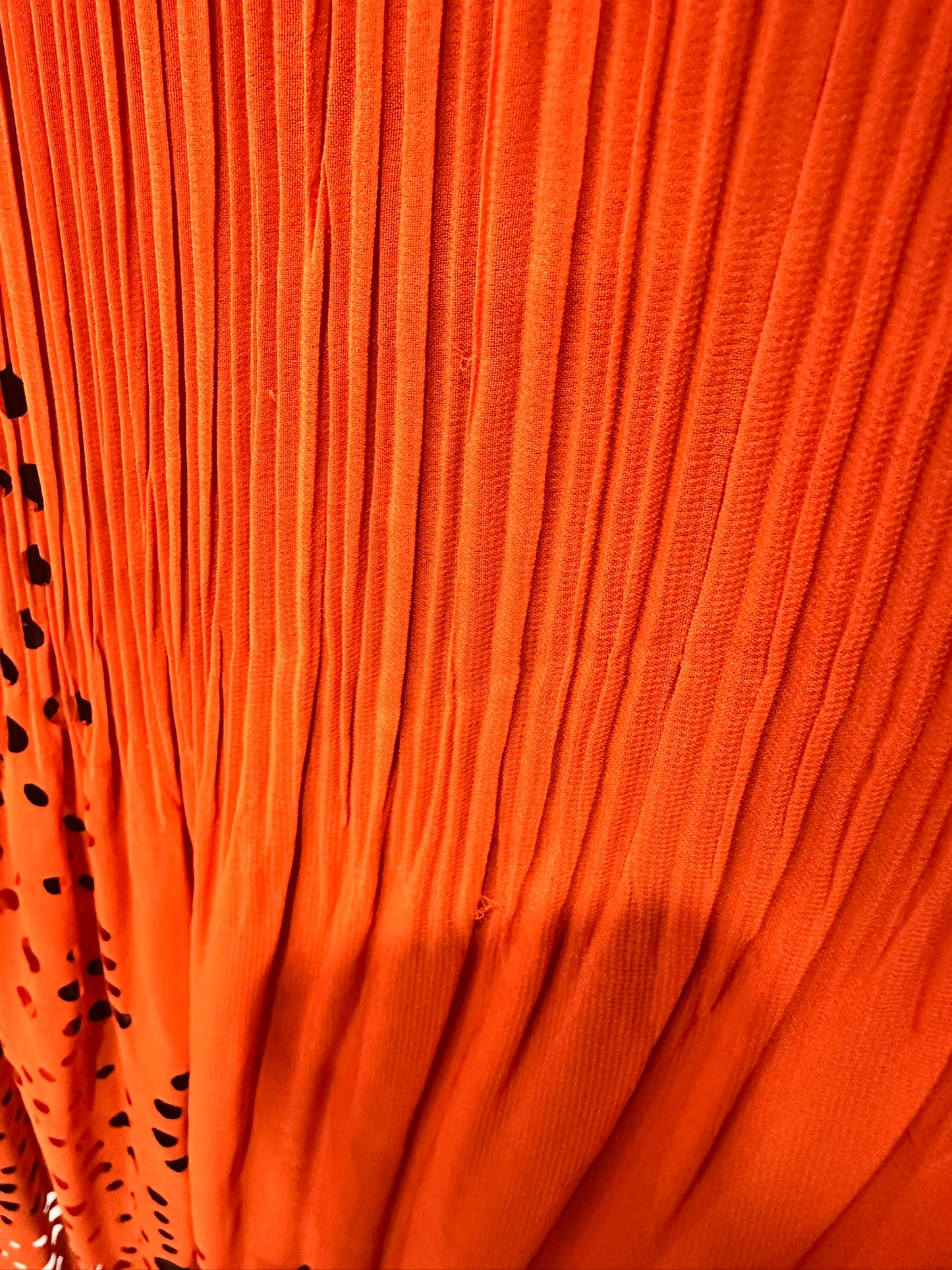 Lior - Sleeveless Pleated Dress in Orange with cut-out detail